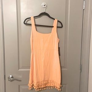 Orange fringe mini dress
